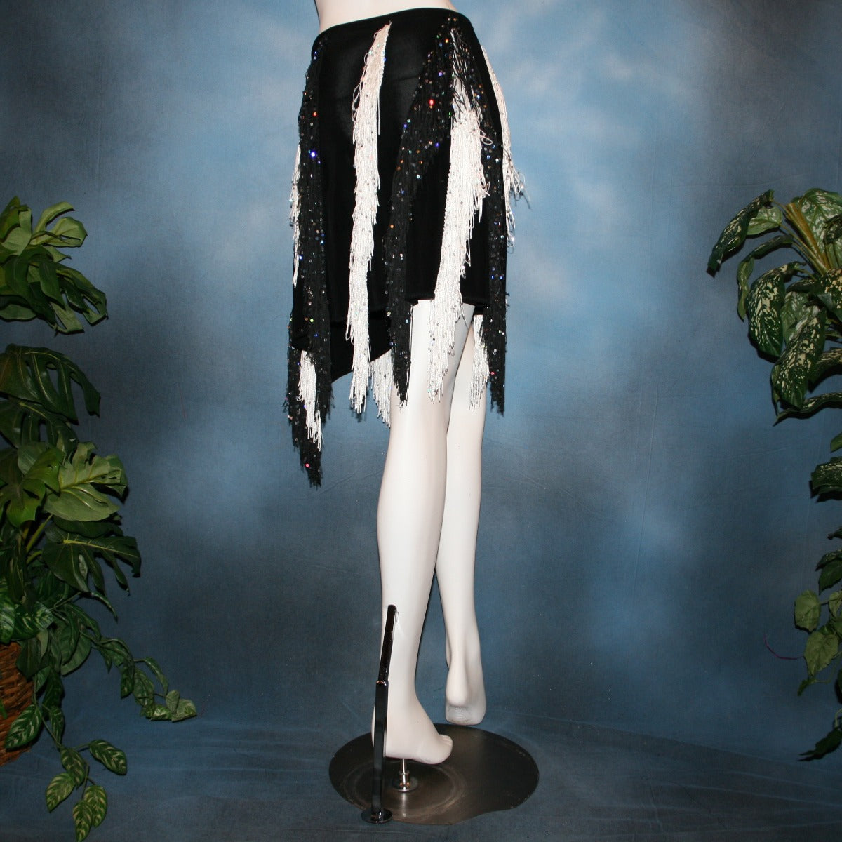 back view of Black & white Latin/rhythm skirt created of luxurious black solid slinky with vertical rows of black & white hologram sequined fringe, would pair greatly with a simple black bodysuit....or a custom created bodysuit or two would be fabulous for versatility, one on the simple classic side & one fabulously ornate with Swarovski rhinestone work!