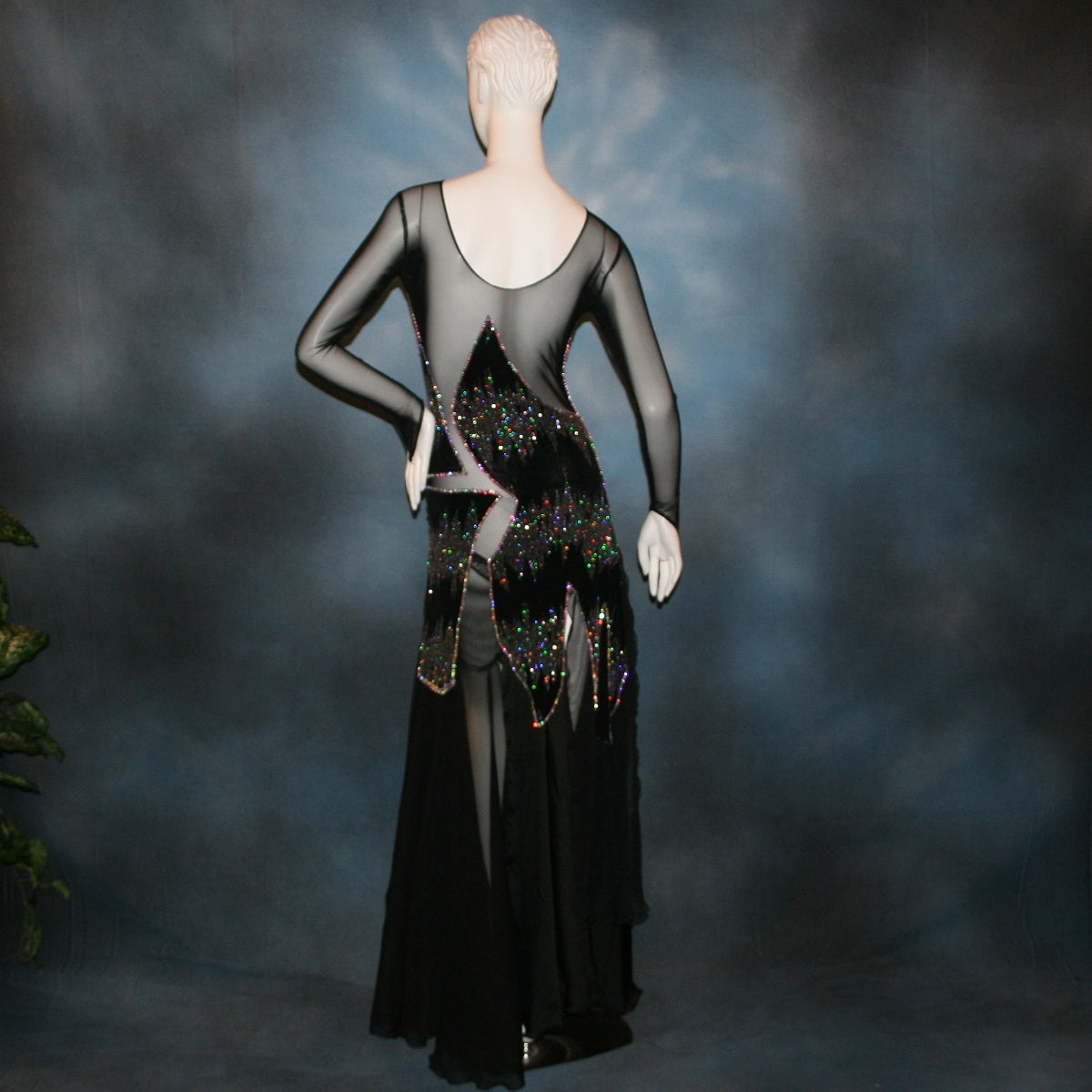 Crystal's Creations back view of Latin/rhythm/converta ballroom dress created in black glitter slinky with an awesome electrifying Crystal AB glitter pattern artistically placed on a black stretch mesh base, embellished with Swarovski Crystal AB rhinestone work. It includes 3 skirts so you have 4 different looks for versatility.