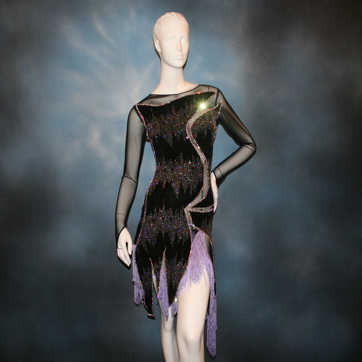 Crystal's Creations lavender underskirt with Latin/rhythm/converta ballroom dress created in black glitter slinky with an awesome electrifying Crystal AB glitter pattern artistically placed on a black stretch mesh base, embellished with Swarovski Crystal AB rhinestone work. It includes 3 skirts so you have 4 different looks for versatility.