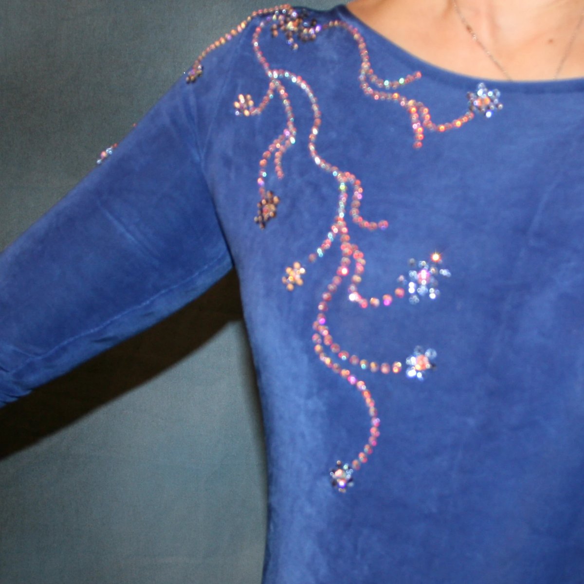 Crystal's Creations close up details of Blue ballroom dress created in sea blue luxurious solid slinky & iridescent shades of blue print chiffon is a converta ballroom dress