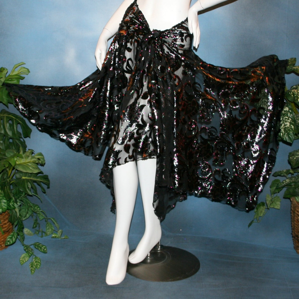 skirt view of Black wrap style panel ballroom skirt was created of black, fuchsia, & emerald green metallic burnout velvet with matching long full sleeve midriff top. This gorgeous ballroom dance set is very sheer, so, wear dance pants & bra or tube top....or...a custom created midriff top to wear underneath the top would look fabulous...in either the fuchsia or emerald green to make it really POP on the ballroom dance floor!