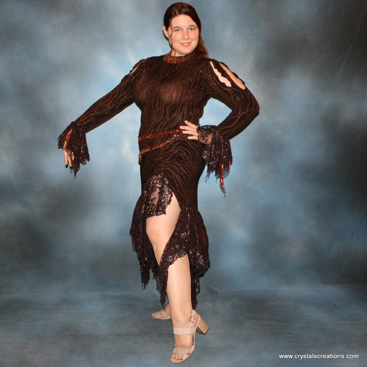 Crystal's Creations Brown tango dress, bolero dress or rumba dress created in chocolate brown & bronze glitter slinky with chocolate brown metallic lace & metallic tricot flounces is embellished with crystal copper Swarovski rhinestones at neckpiece & hipsash, which also has extensive hand beading.