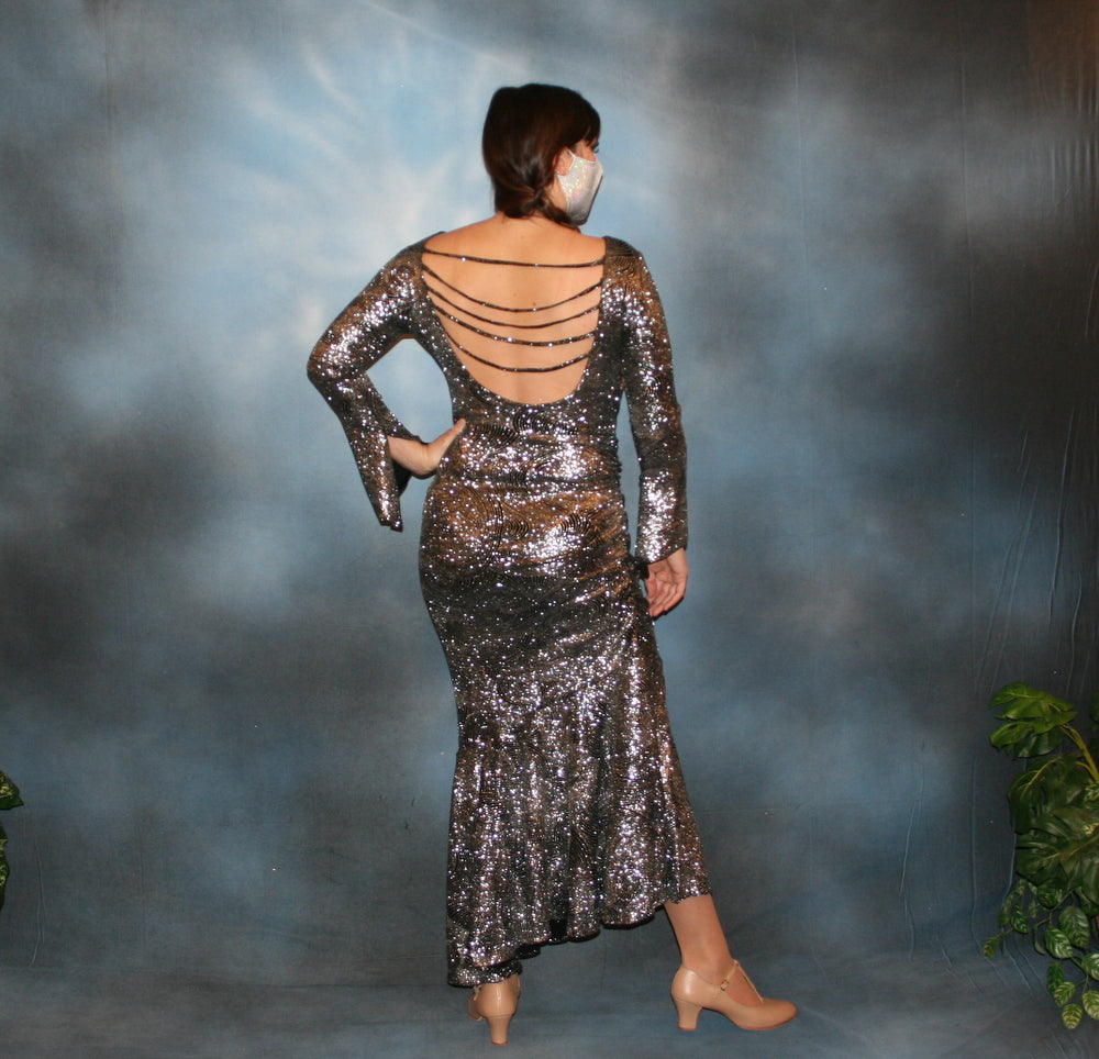 Crystal's Creations back view of Silver Latin/rhythm/tango dress created of silver swirls glitter slinky with sleek & elegant lines, long flared sleeves & low back with strap details,  size 5/6-11/12, very stretchy