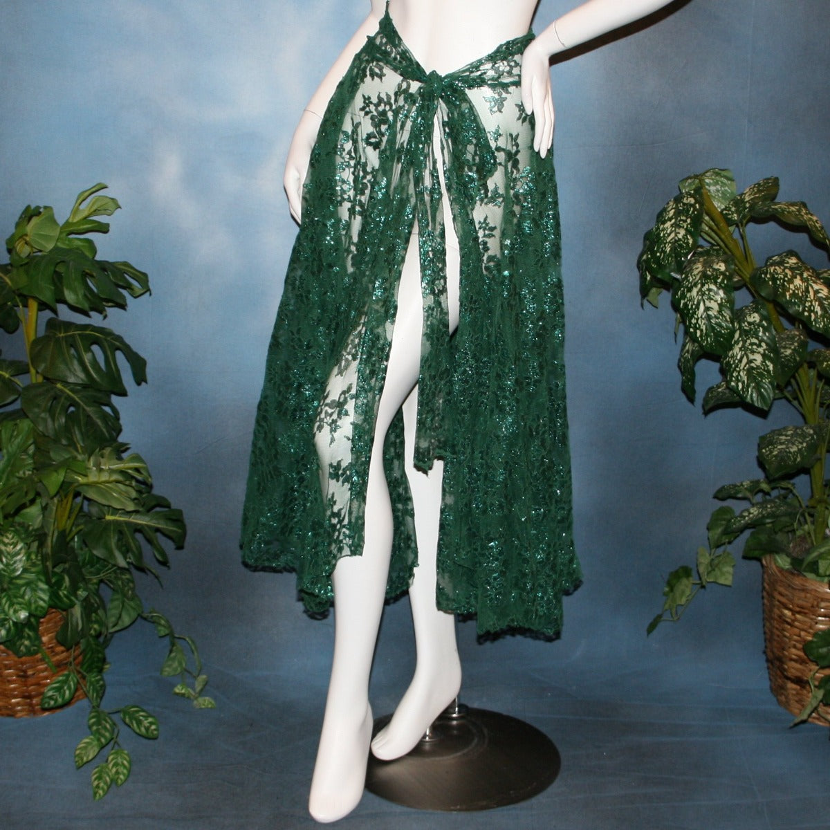 Very full emerald green lace ballroom skirt, wrap style, was created with yards of deep emerald green metallic lace.