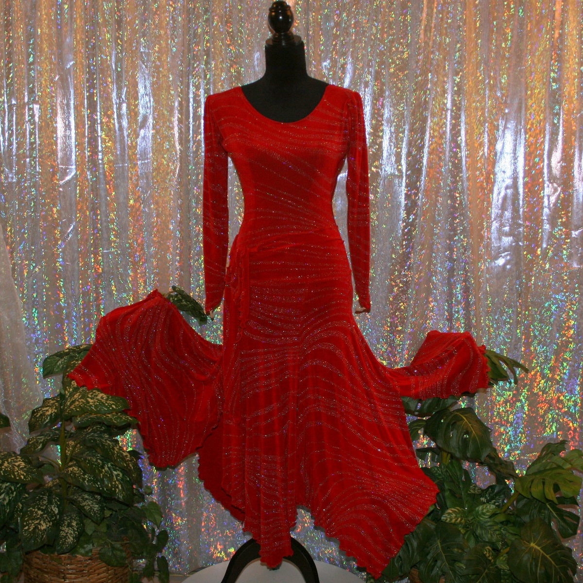 Red 3 piece ballroom converta dress consisting of a long sleeve red bodysuit, Latin-rhythm skirt with hand beading, smooth waltz length skirt plus neck piece with hand beading created out of  deep red glitter slinky with a gorgeous wave pattern shown with smooth skirt & minus the neck piece