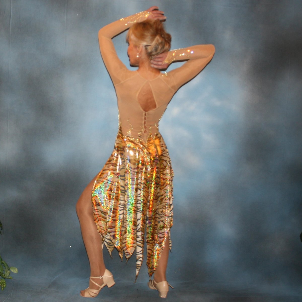 Crystal's Creations back view of gold hologram tiger print Latin/rhythm dress on nude illusion base with light yellow Swarovski rhinestone work size 1/2-5/6