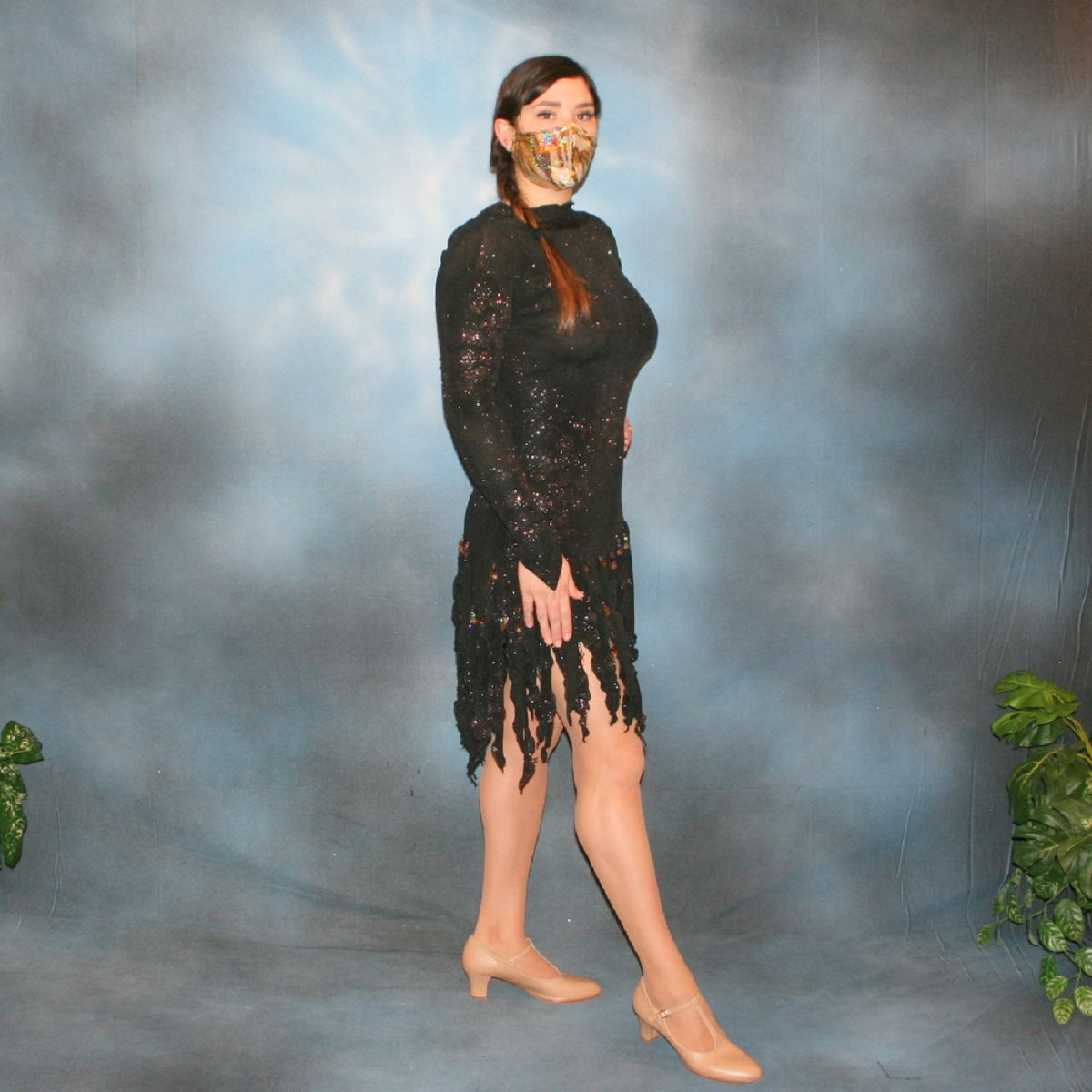 Crystal's Creations side view of Elegant black Latin/rhythm dress was created in glitter black slinky with delicate, gorgeous, yet subtle, blue & bronze print in the glitter, embellished lavishly with Swarovski hand beaded detailing through out!