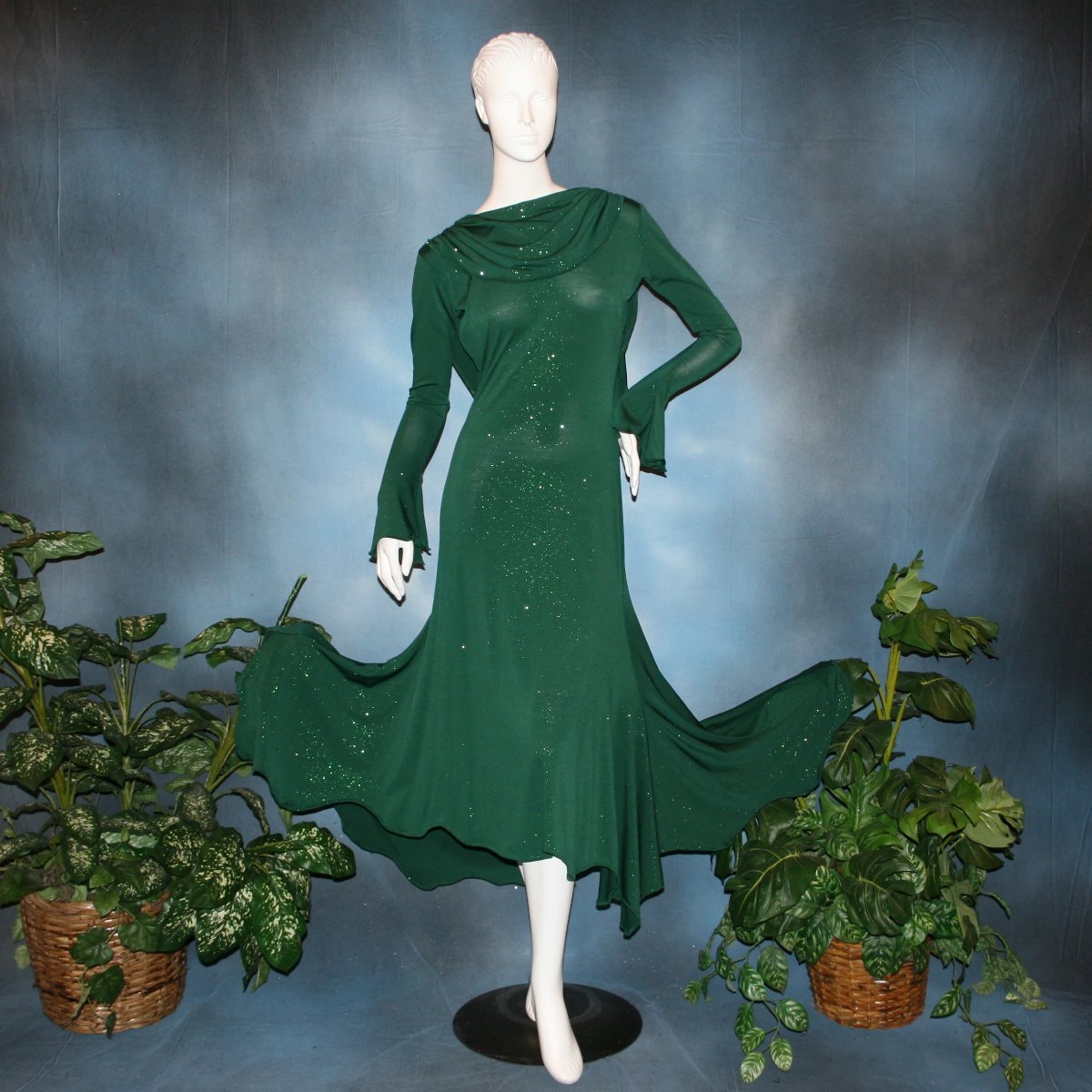 Crystal's Creations Green social ballroom dress was created in luxurious deep emerald glitter slinky, with full  & flaring skirt bottom, long flair sleeves & draping trailing down the back makes this gorgeous dress very elegant & classy!