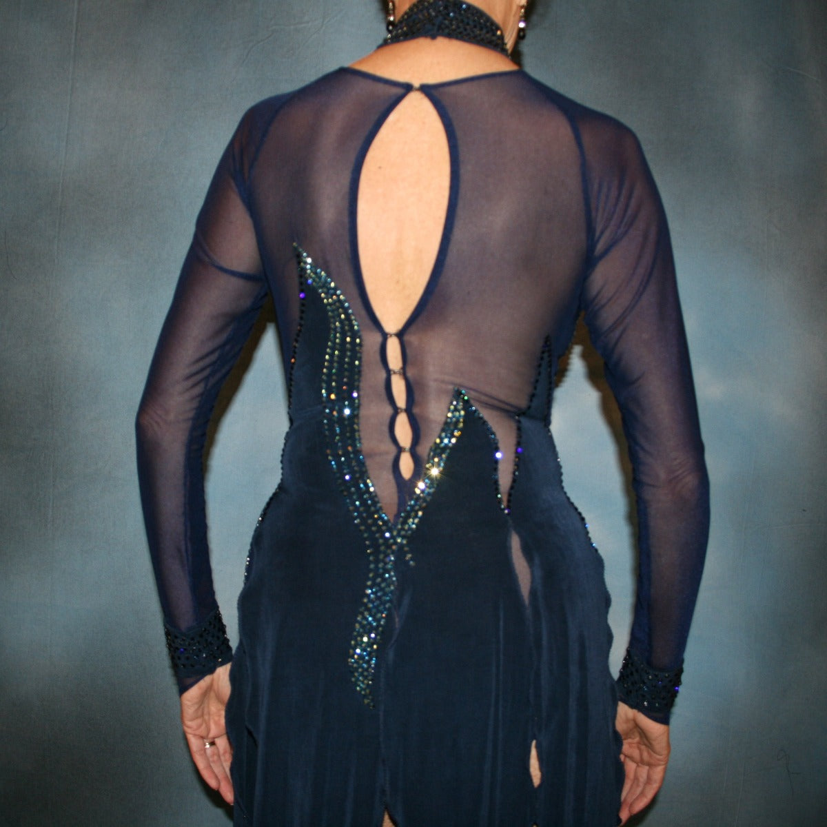 Crystal's creations close up back view of Navy blue Latin/rhythm dress was created in luxurious navy solid slinky & sheer mesh… embellished with montana(navy) & montana AB Swarovski rhinestone work.