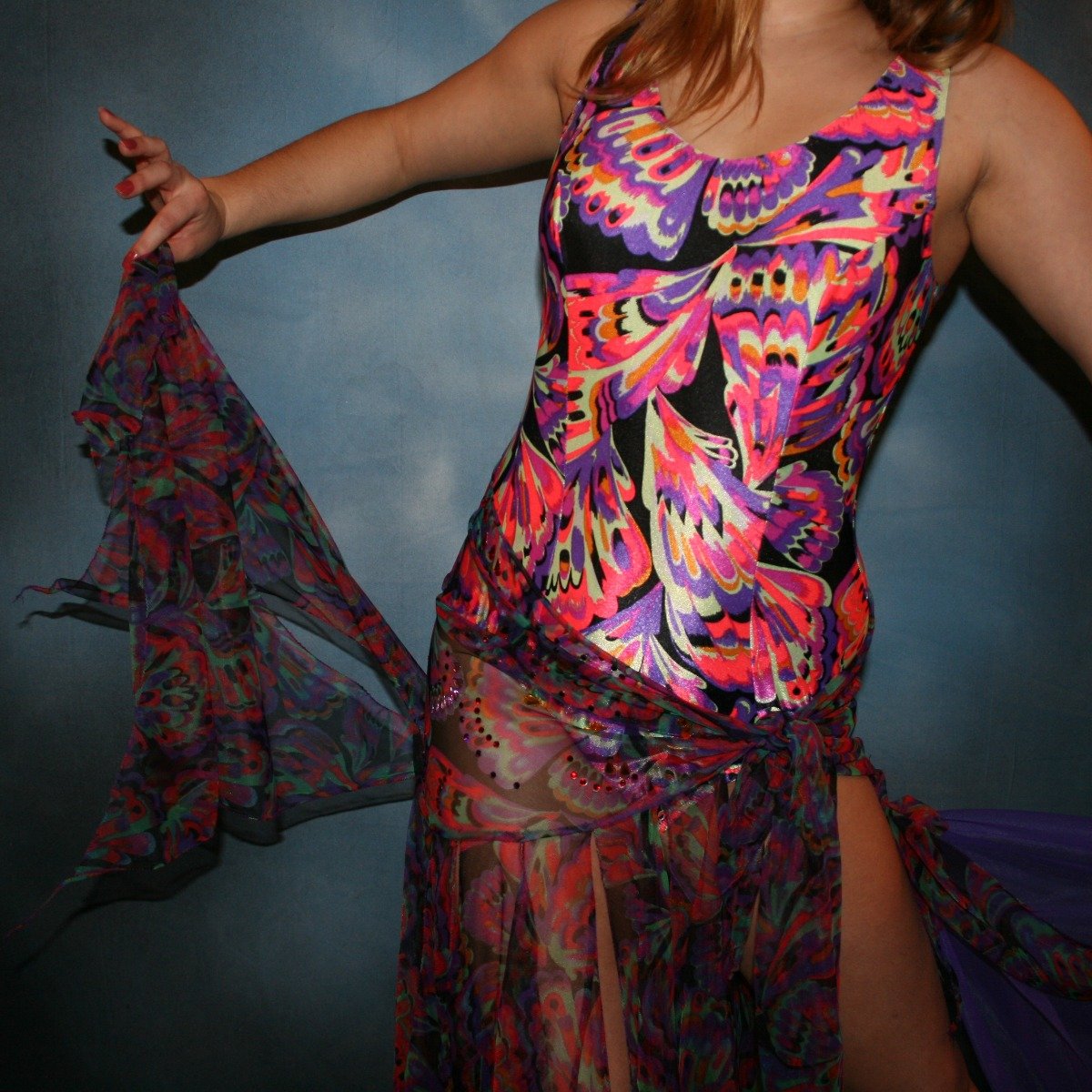 Crystal's Creations close view of a very colorful theatrical ballroom dance dress