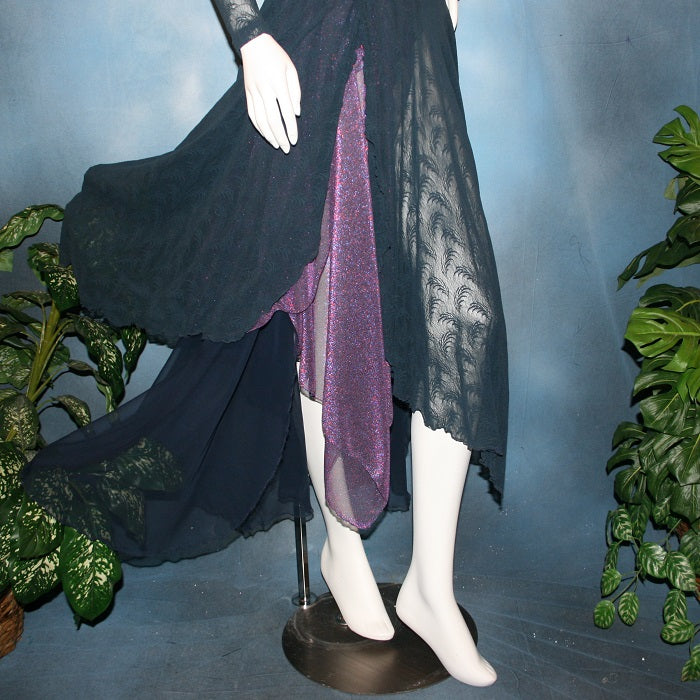 Crystal's Creations lower side view of Navy blue ballroom dance dress created in yards of navy stretch lace over lycra base bodysuit with glittery metallic sheer accents in purple, light sapphire Swarovski rhinestones embellish this classic, which is great for a theatrical dance or a solo specialty dance, as well as a beautiful waltz or foxtrot dress!