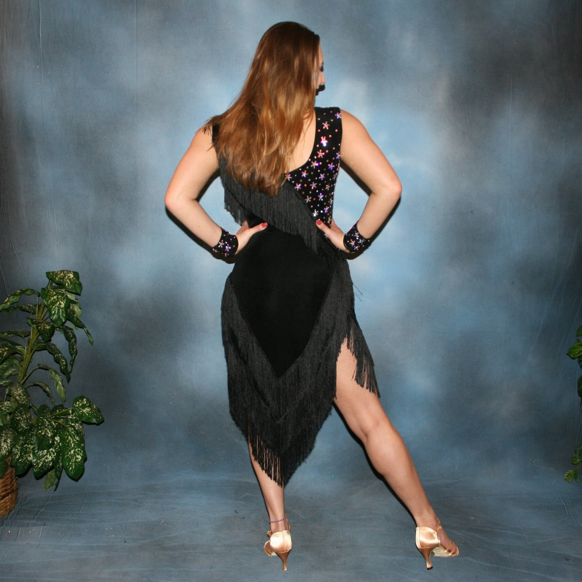 Crystal's Creations back view of Black Latin/rhythm dress with fringe created in luxurious black solid slinky with silky black chainette fringe, wristbands, matching choker, embellished with CAB Swarovski rhinestones, about 7 gross.