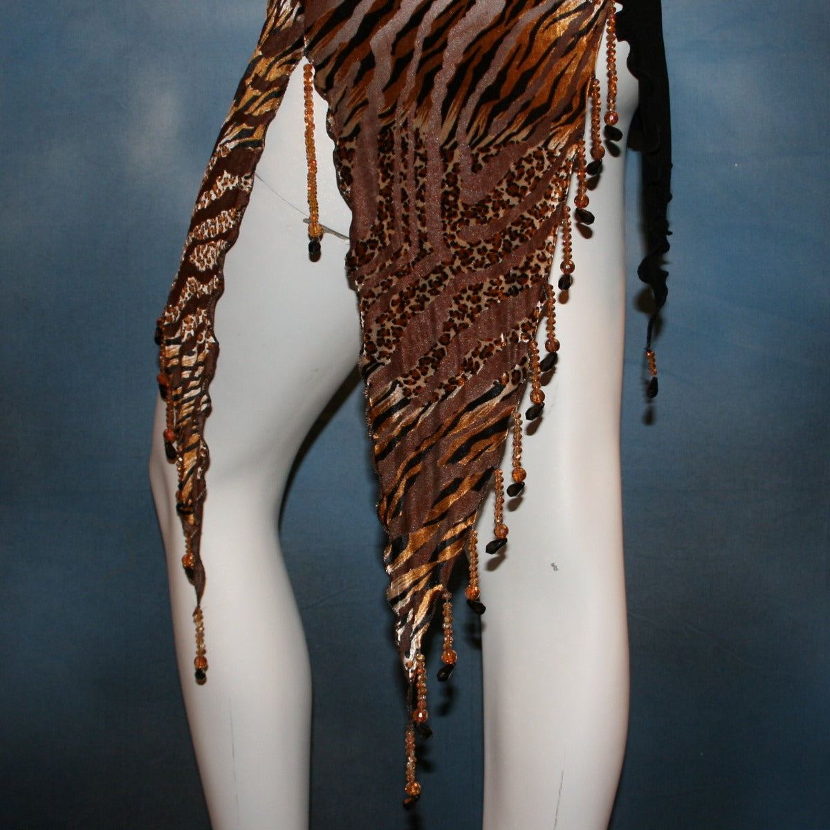 Crystal's Creations clsoe up detail of Slinky Latin/rhythm dress or tunic top created of luxurious black slinky & Serengeti print burnout velvet is embellished with Swarovski hand beading, is fabulous as a Latin/rhythm dress if you love to show your legs...or...you can team it as a tunic top with skirts or pants!