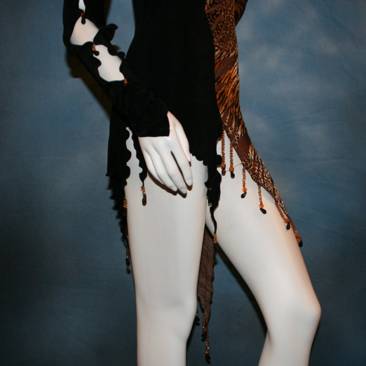 Crystal's Creations right side detail of Slinky Latin/rhythm dress or tunic top created of luxurious black slinky & Serengeti print burnout velvet is embellished with Swarovski hand beading, is fabulous as a Latin/rhythm dress if you love to show your legs...or...you can team it as a tunic top with skirts or pants!