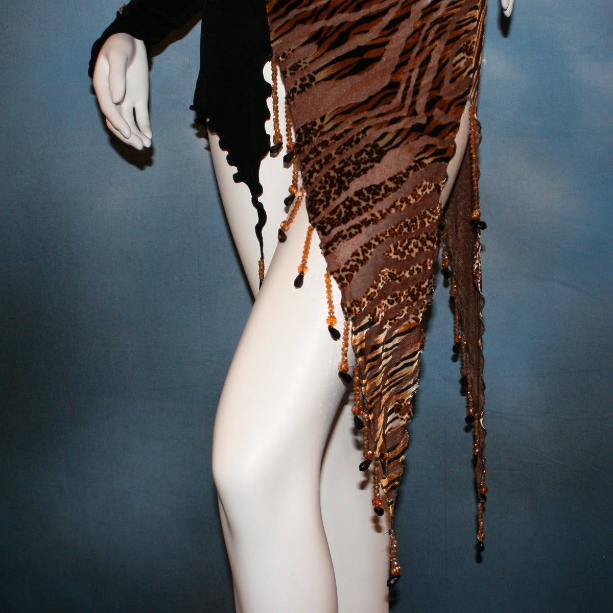 Crystal's Creations left front detail of Slinky Latin/rhythm dress or tunic top created of luxurious black slinky & Serengeti print burnout velvet is embellished with Swarovski hand beading, is fabulous as a Latin/rhythm dress if you love to show your legs...or...you can team it as a tunic top with skirts or pants!