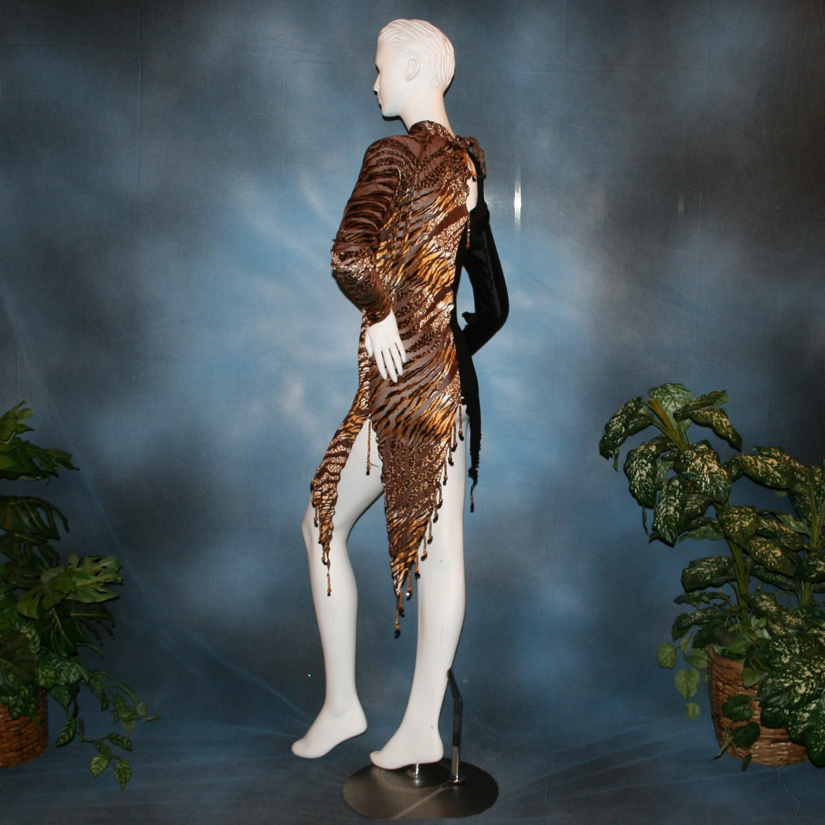 Crystal's Creations side view of Slinky Latin/rhythm dress or tunic top created of luxurious black slinky & Serengeti print burnout velvet is embellished with Swarovski hand beading, is fabulous as a Latin/rhythm dress if you love to show your legs...or...you can team it as a tunic top with skirts or pants!