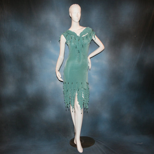 Crystal's Creations Aqua Latin/rhythm dress created in luxurious aqua solid slinky fabric, featuring exquisite petal detailing, with extensive metallic aqua hand beading. A great social ballroom dance dress for any special occasion, as well as a great beginner Latin show dance dress!