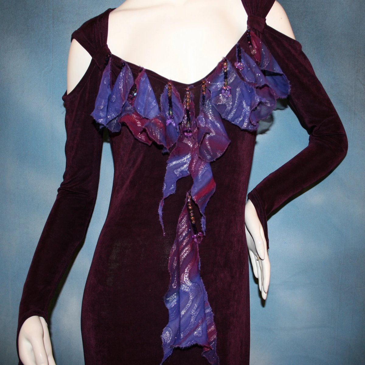 close up view of Social ballroom dance dress created in luxurious wine solid slinky fabric with flounces of deep scarlette & wine printed & dazzling chiffon, with Swarovski hand beading. A great social dress for any ballroom dance or special occasion, as well as a great beginner ballroom dance show dress!