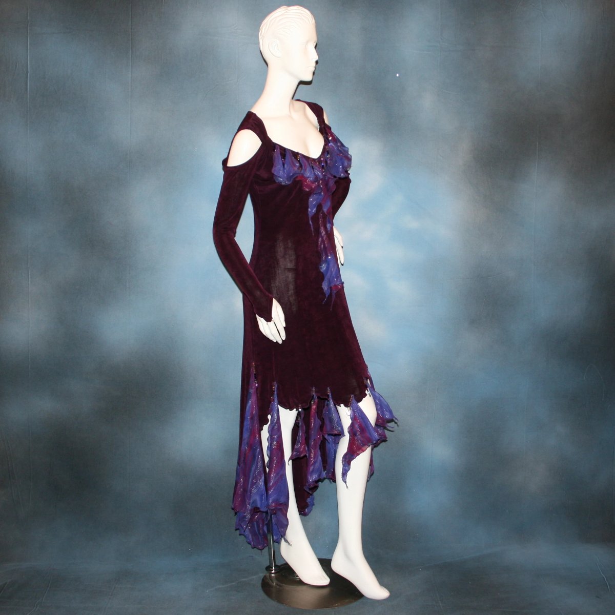 side view of Social ballroom dance dress created in luxurious wine solid slinky fabric with flounces of deep scarlette & wine printed & dazzling chiffon, with Swarovski hand beading. A great social dress for any ballroom dance or special occasion, as well as a great beginner ballroom dance show dress!