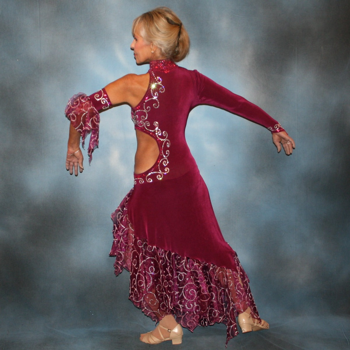 Crystal's Creations back view of Magenta tango dress or Latin/rhythm dress done in luxurious magenta solid slinky with oodles of scrollwork embellished organza flounces with fuchsia & crystal Swarovski rhinestones.