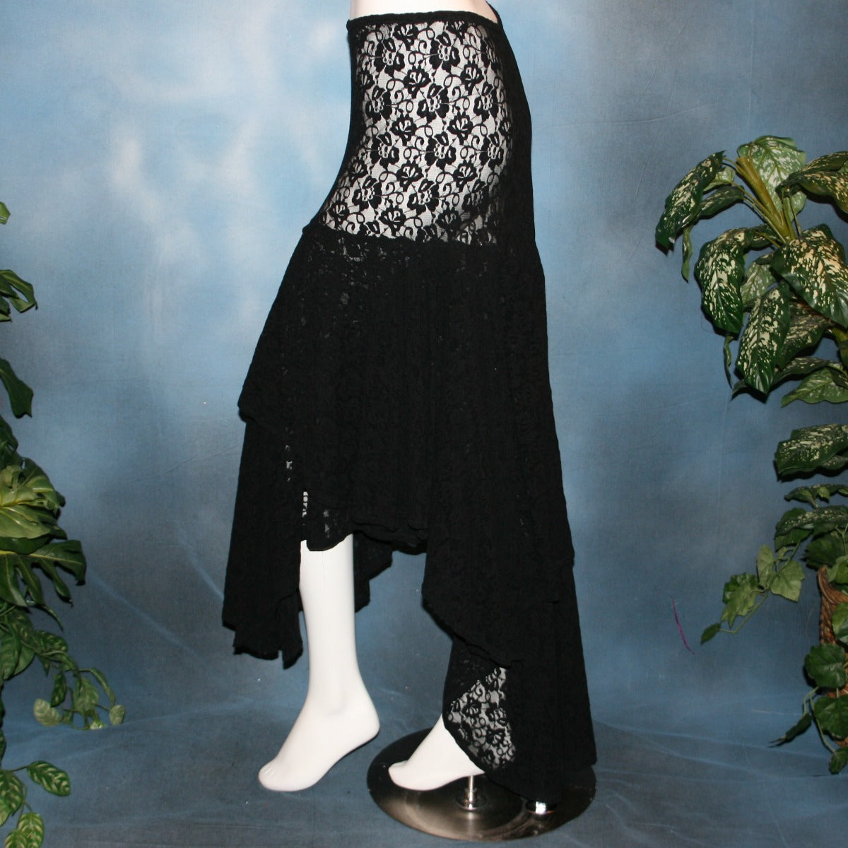 Crystal's Creations side view of Black lace Latin/rhythm skirt, 2 tier style, was created with yards of back stretch lace, with 2 full circles cut with sides higher, back longer on a hip base.
