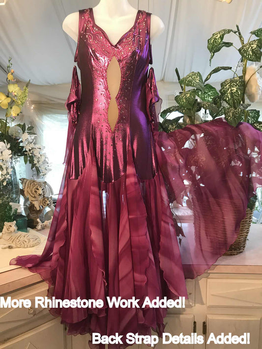 Crystal's Creations Purple/plum ballroom dress created of rich & luxurious plum metallic slinky ballroom dance dress with yards & yards of print chiffon… embellished with fuchsia Swarovski rhinestones… along with hand beading of bicone & teardrop Swarovski beads has added rhinestone work & back strap details
