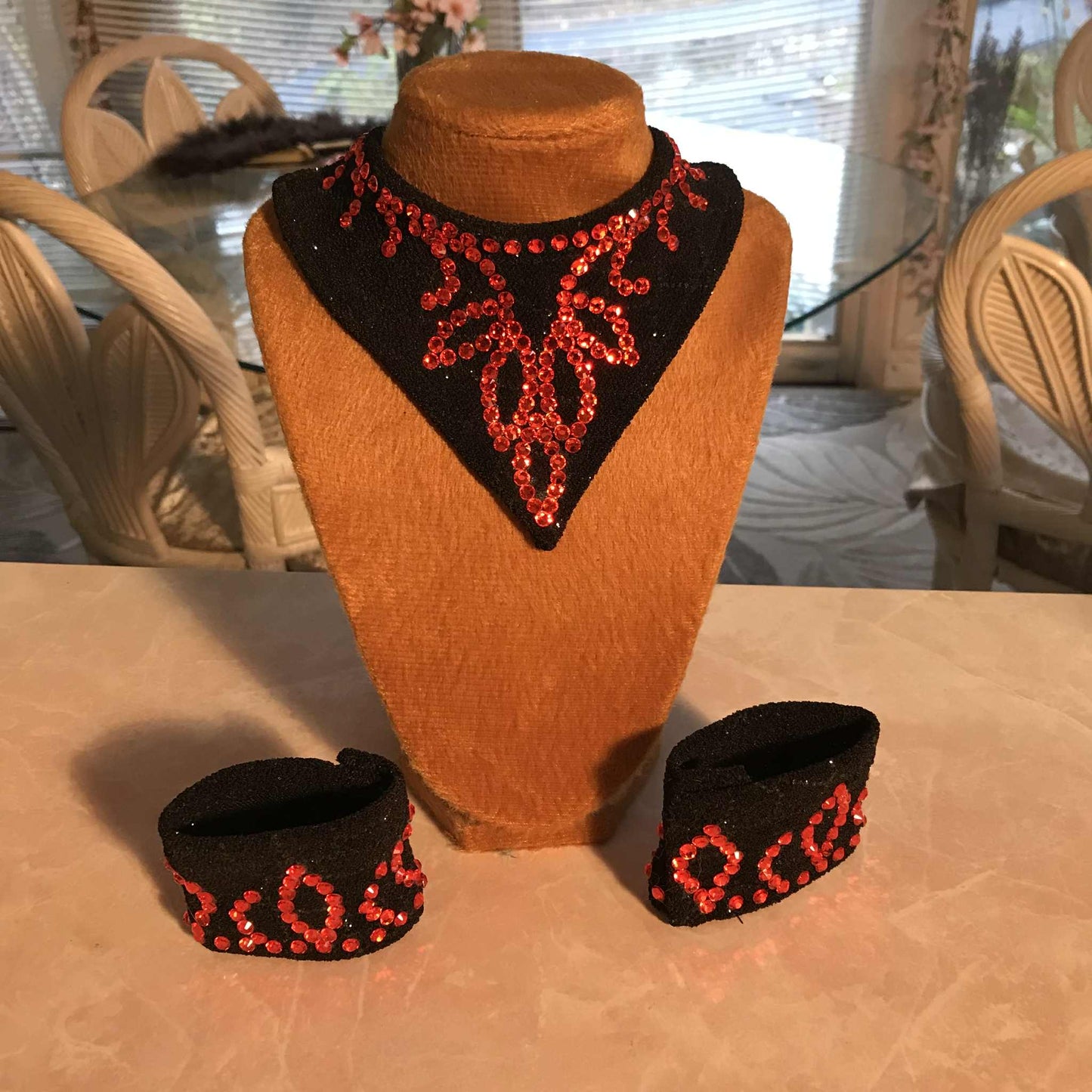 Black Neckpiece & Wristbands with Orange Rhinestones