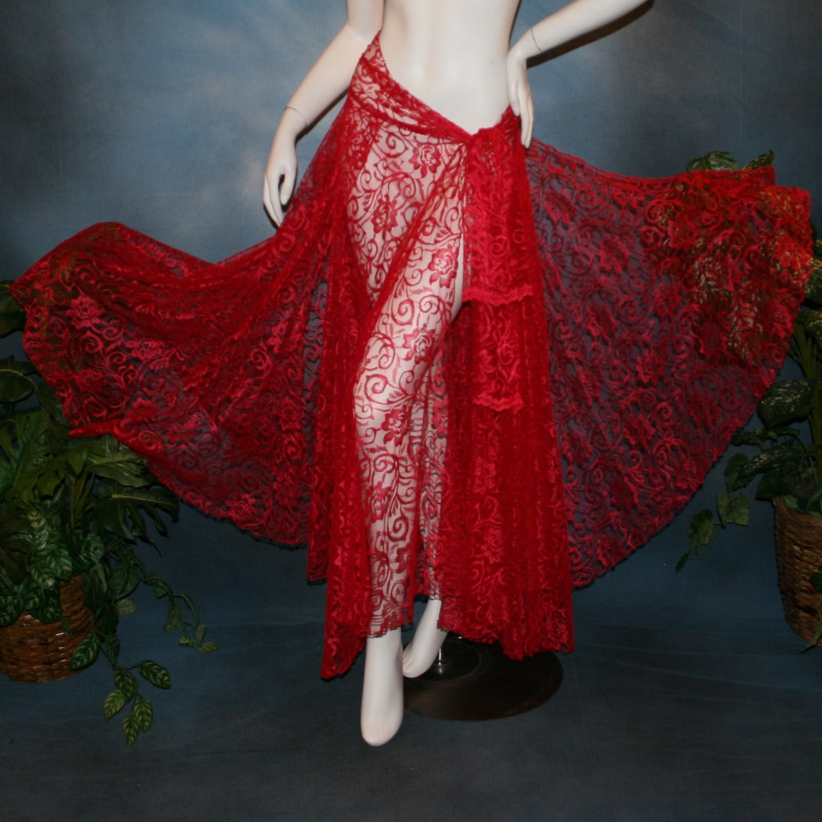Crystal's Creations Red lace ballroom skirt, wrap style, was created with yards of red lace, many panels shaped like large petals.