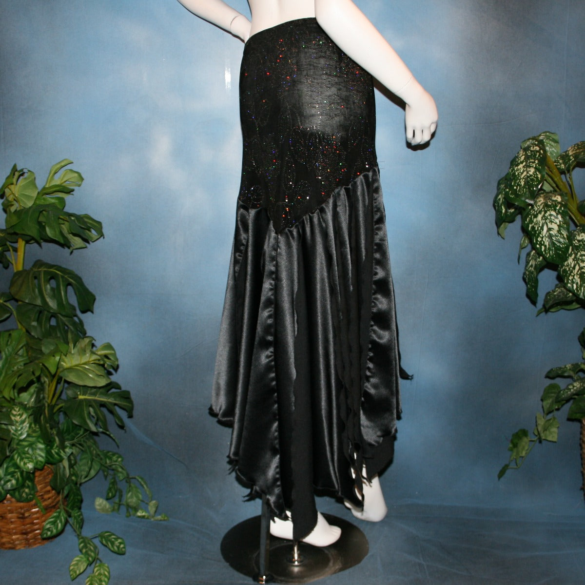 Crystal's Creations back view of Black ballroom skirt created with a beautifully patterned glitter slinky sarong hip sash piece that flairs out to yards of black satin panels, would pair beautifully with a black body suit or one could be custom created for an extra fee.