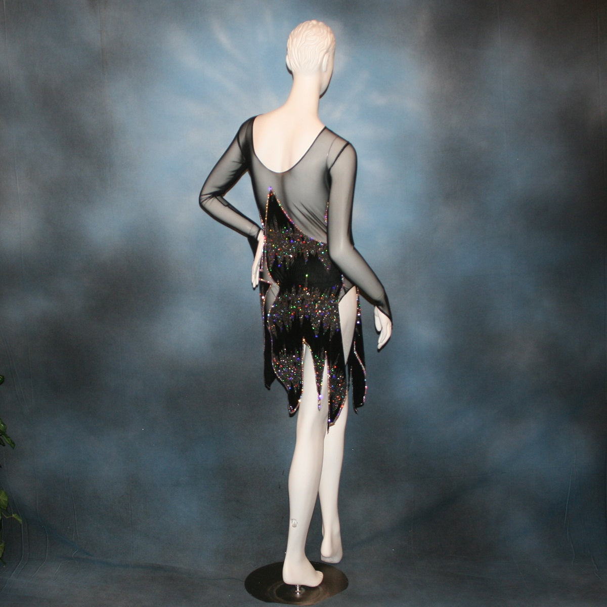 Crystal's Creations back view of Latin-Rhythm dress portion of Latin/rhythm/converta ballroom dress created in black glitter slinky with an awesome electrifying Crystal AB glitter pattern artistically placed on a black stretch mesh base, embellished with Swarovski Crystal AB rhinestone work. It includes 3 skirts so you have 4 different looks for versatility.