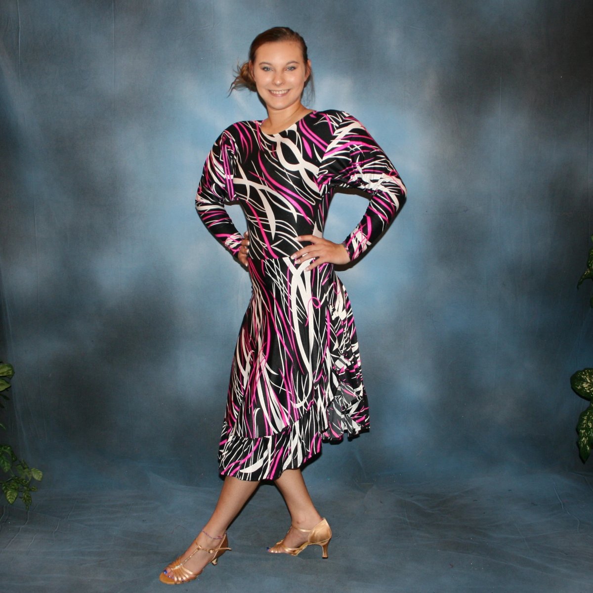 side view of Abstract print bodysuit with long sleeves & Latin/rhythm dance skirt in black, white & hot pink abstract print lycra fabric, great for any ballroom dance, ballroom teachers or practice…or embellish with Swarovski work for show or competition!  worn once.