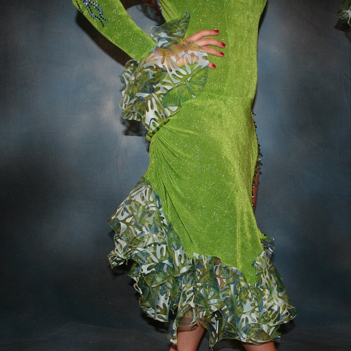 Crystal's Creations right side view of Green Latin/rhythm dance dress was created in apple green glitterknit slinky & printed chiffon flounces, embellished with sapphire & light sapphire Swarovski rhinestones, with hand beading. 