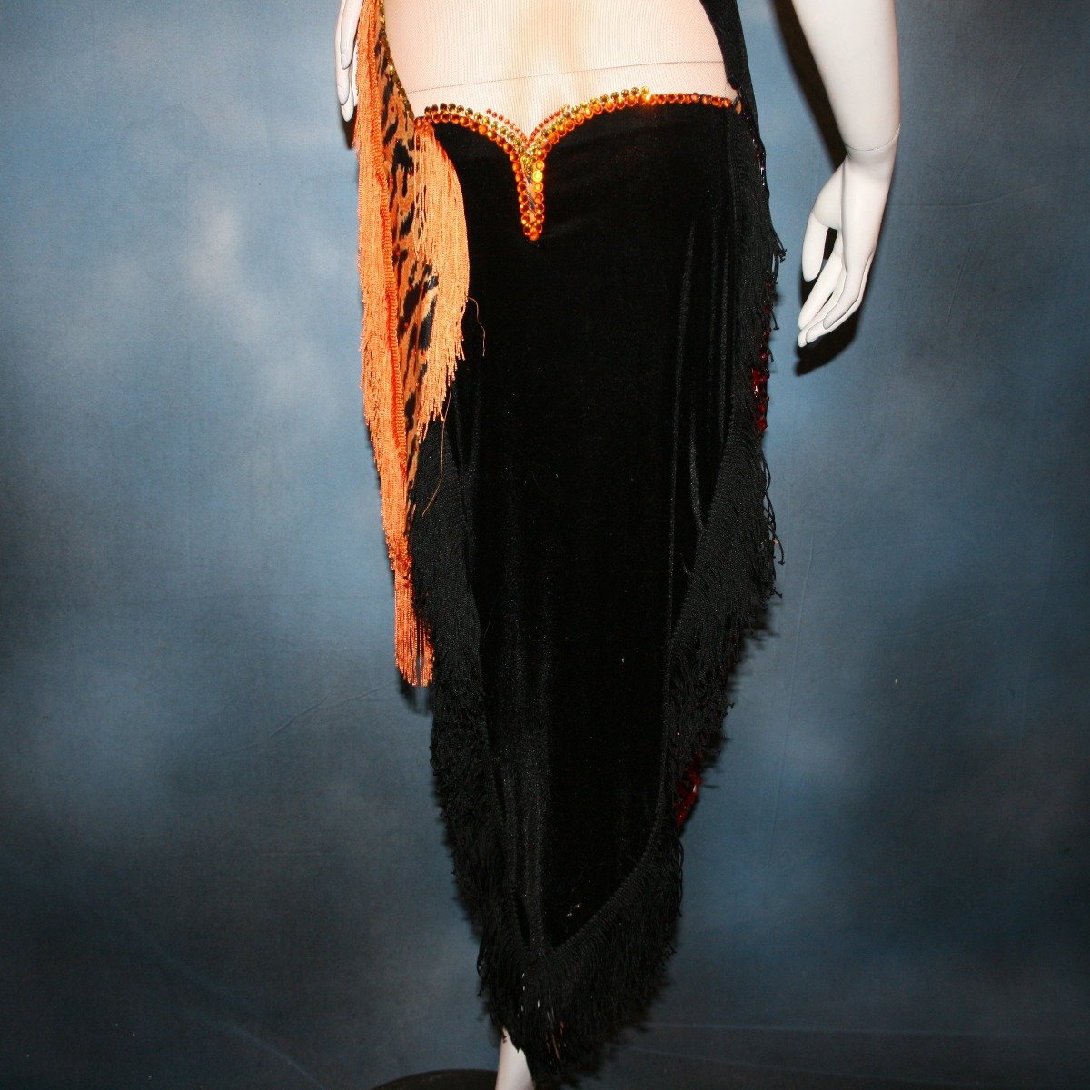 Crystal's Creations back close up view of orange & black tiger print Latin/rhythm dress with fringe