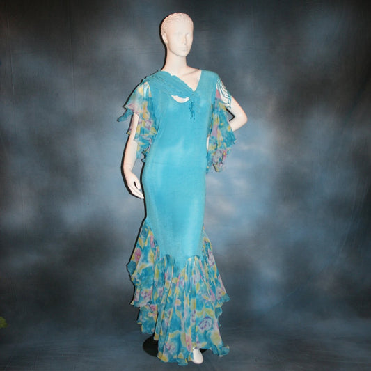 Blue social ballroom dress of luxurious robin egg blue slinky, print chiffon flounces & floats with touches of orchid & yellow, embellished with Swarovski hand beading, is lovely for any ballroom dance or special occasion, and a fabulous beginner ballroom dancer show dress!