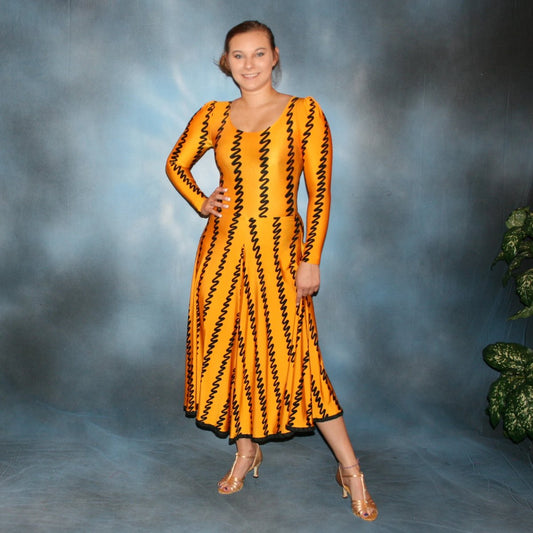 Deep yellow long sleeved bodysuit & flaired ballroom skirt created in deep yellow print lycra with black zig zag vertical print, black binding on skirt edge. Great for any ballroom dance, practice, ballroom teachers or social event!