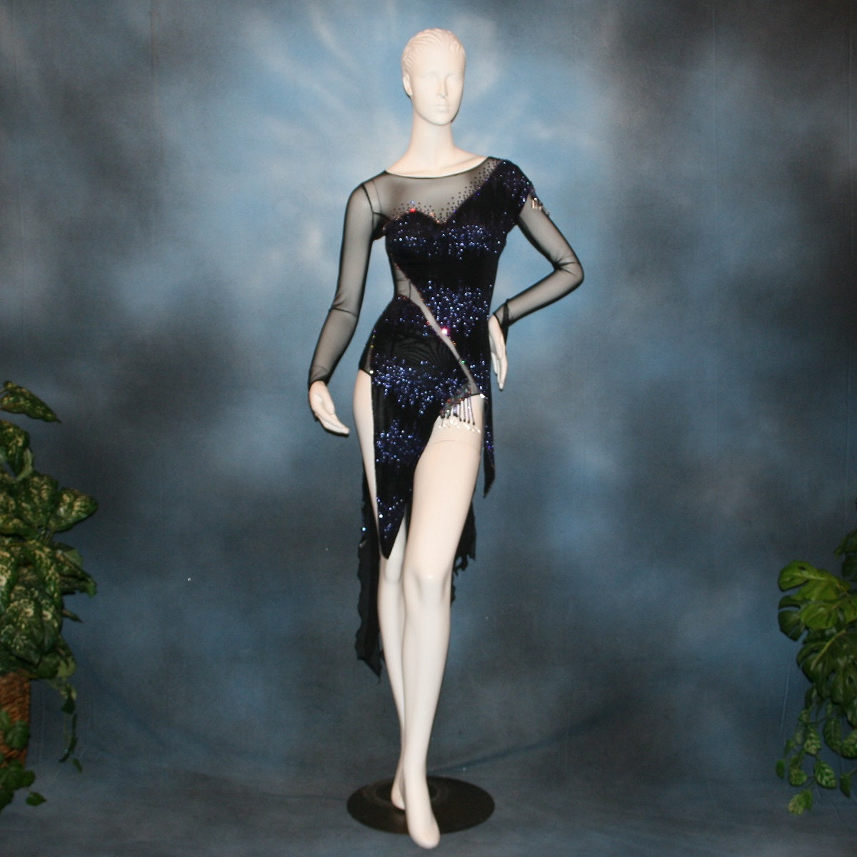 Crystal's Creations Latin/rhythm/tango dress created in black glitter slinky with an awesome electrifying tanzanite/perwinkle glitter pattern artistically placed on a black stretch mesh base