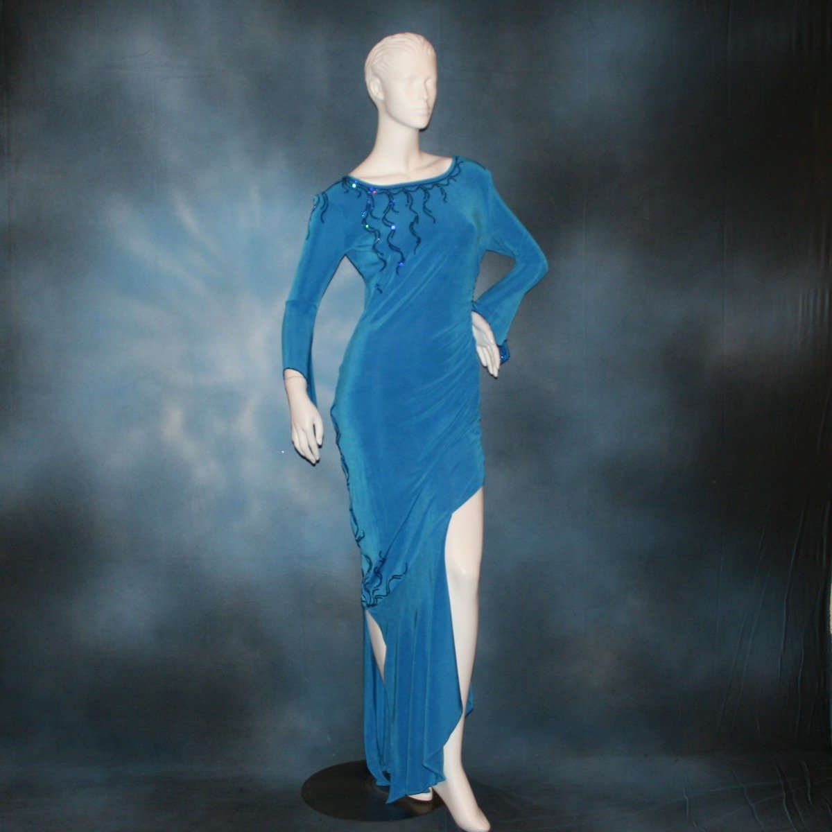 Crystal's Creations blue Latin/rhythm dress created of luxurious blue slinky, embellished with Swarovski detailed rhinestone work