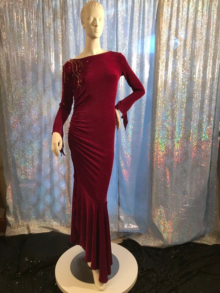 Crystal's Creations Magenta Latin/rhythm/tango dress created out of deep magenta/wine slinky features ruching, long flared sleeves & is embellished with gold aurum Swarovski rhinestone work with a bit of Swarovski bead detail on back strap