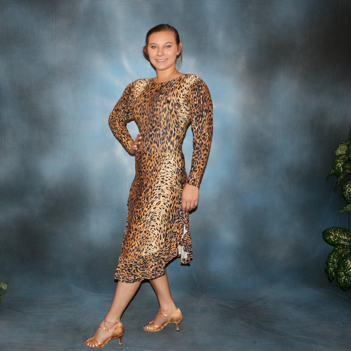 side view of Cheetah print bodysuit with long sleeves & double ruffle split Latin/rhythm skirt of exact cheetah print lycra, great for any ballroom dance, practice…or beginner ballroom dancers, embellish with Swarovski work for show or competition!