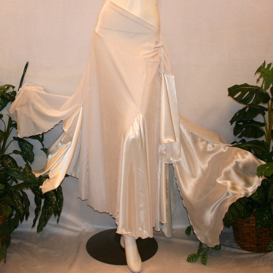 flared view of White ballroom skirt is very full & created of luxurious white stretch velvet with white charmeuse insets & floats has a hip sash with Swarovski hand beaded accents.