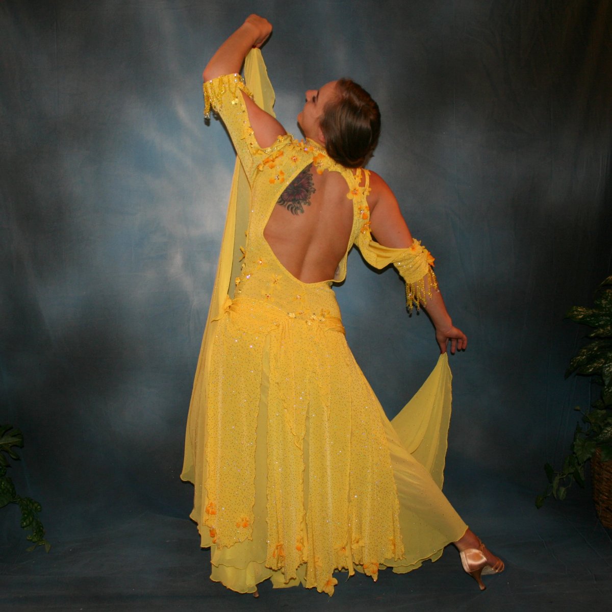 Crystal's Creations back view of Yellow ballroom dress created in sunny yellow slinky glitterknit with glitter gold flocked yellow chiffon