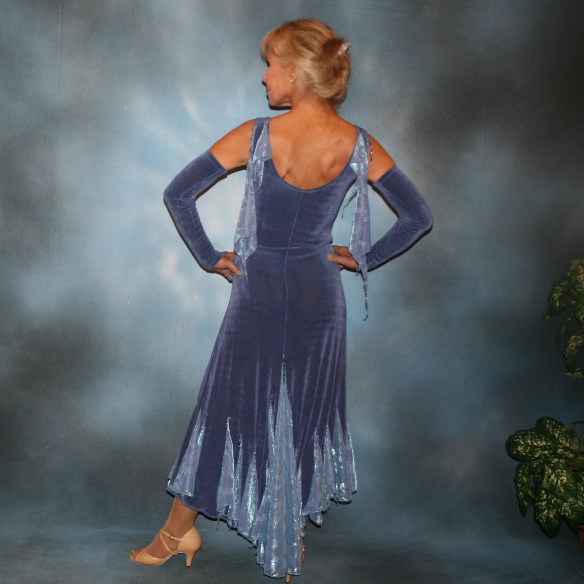 Crystal's Creations back view of Beautiful slate blue classic ballroom dress with princess seaming, created in luxurious solid slinky with iridescent insets, flounces & small floats, embellished with Swarovski hand beading. Lovely as is for any ballroom dance, social event or beginner show dance dress
