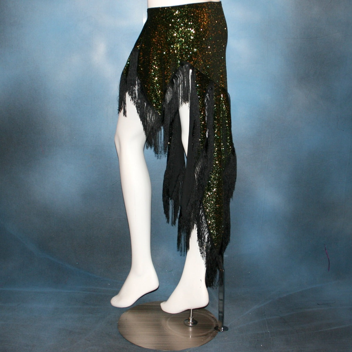Crystal's Creations side view of green Latin fringy skirt created of luxurious green glitter slinky