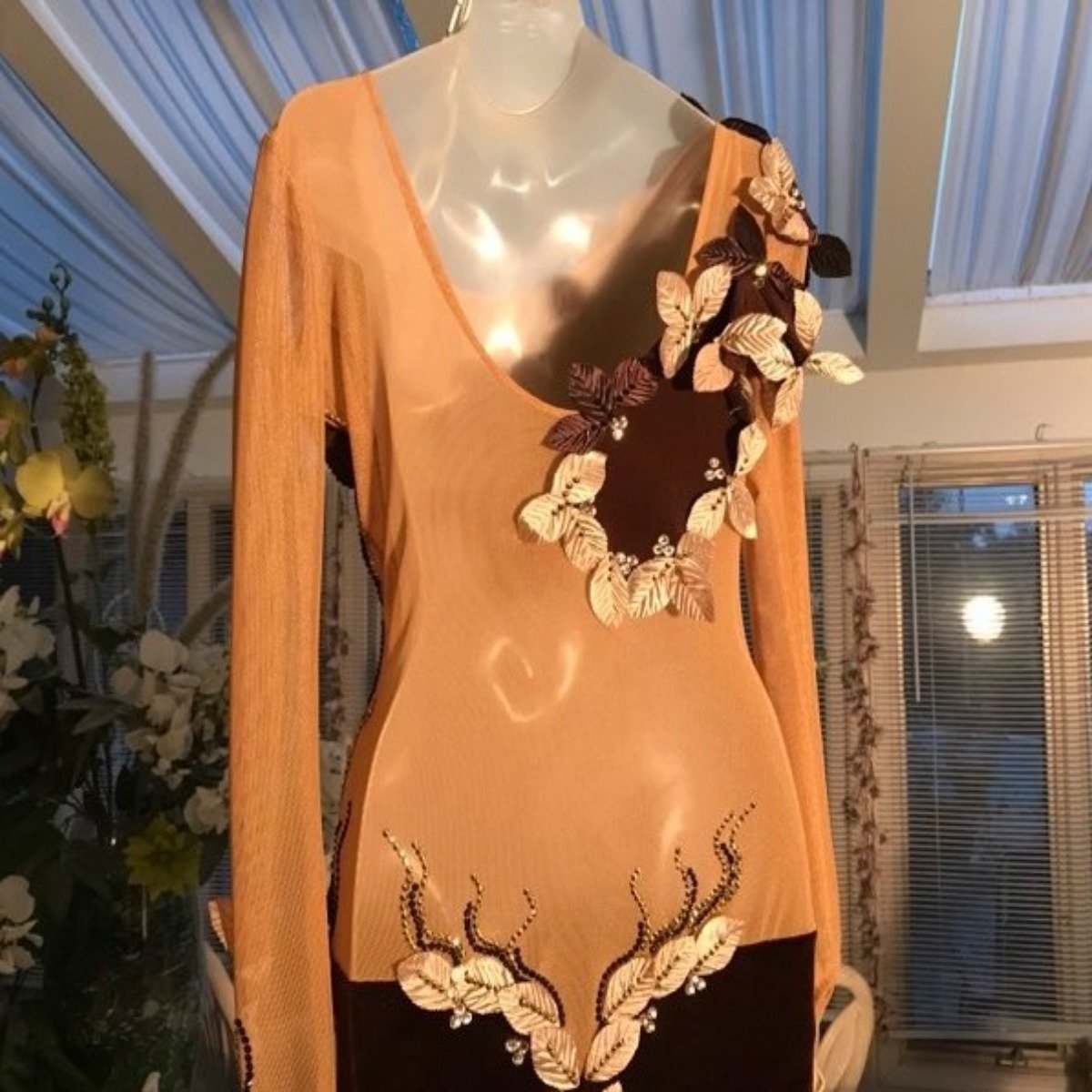 Crystal's Creations close back view of brown Latin/rhythm dress created in luxurious chocolate brown stretch velvet & luxurious solid chocolate brown slinky on a nude illusion base, embellished with delicate silk leaves, as well as gold aurum & mocca Swavski detailed rhinestone work, size 1/2-5/6