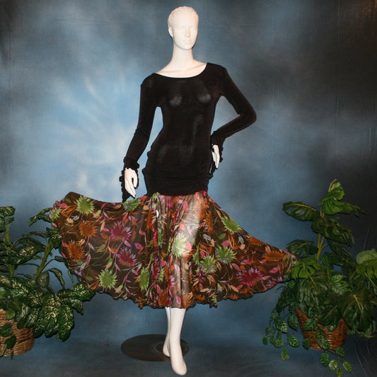 Crystal's Creations Deep chocolate brown social ballroom dress created of luxurious deep chocolate brown solid slinky base featuring ruching through the hip area, & interesting long flared sleeves, with yards of fall colored flowers chiffon petal panels