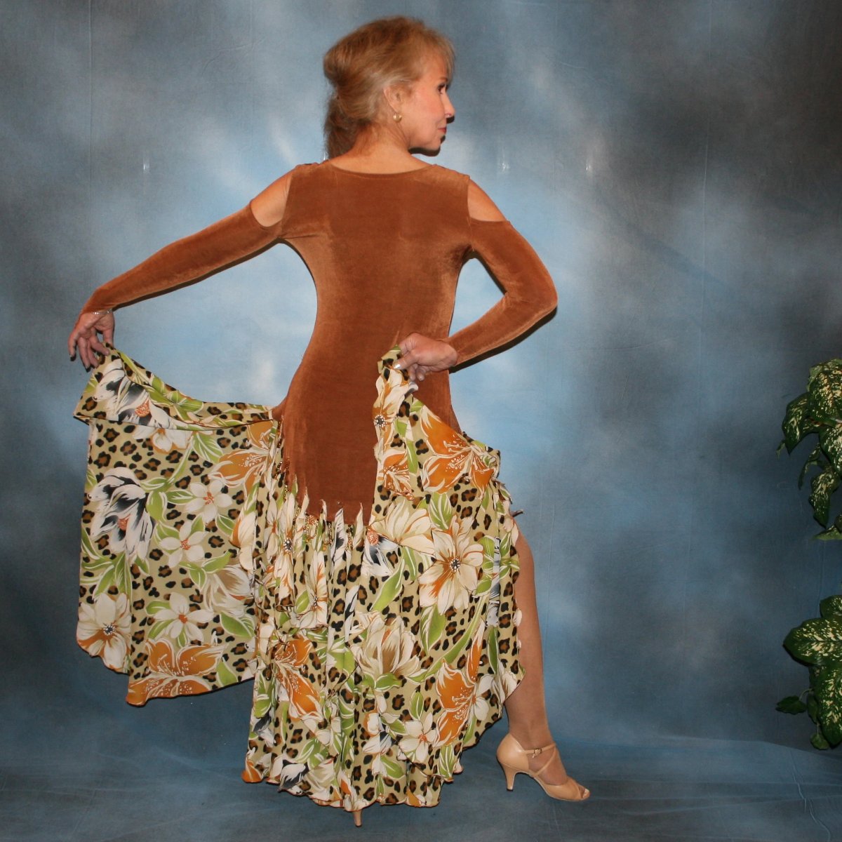 Crystal's Creations back view of Latin/rhythm/ballroom dance dress of luxurious cinnamon/ginger colored solid slinky with flounces of tropical/leopard print, enhanced with hand beading through out the flounces is a converta-ballroom dress