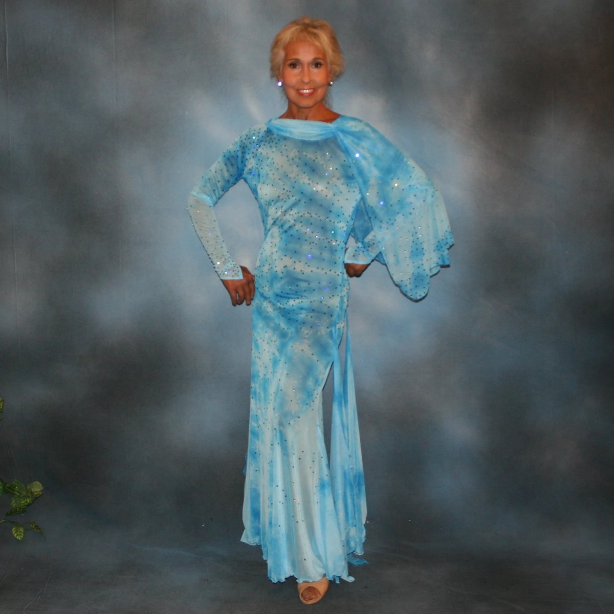 Crystal's Creations Elegant blue ballroom dress created in shades of blue printed semi sheer stretch with floats, fabulous for a solo ballroom dance or a theatrical ballroom number…embellished with Swarovski rhinestone work in shades of capri blue & aquamarine