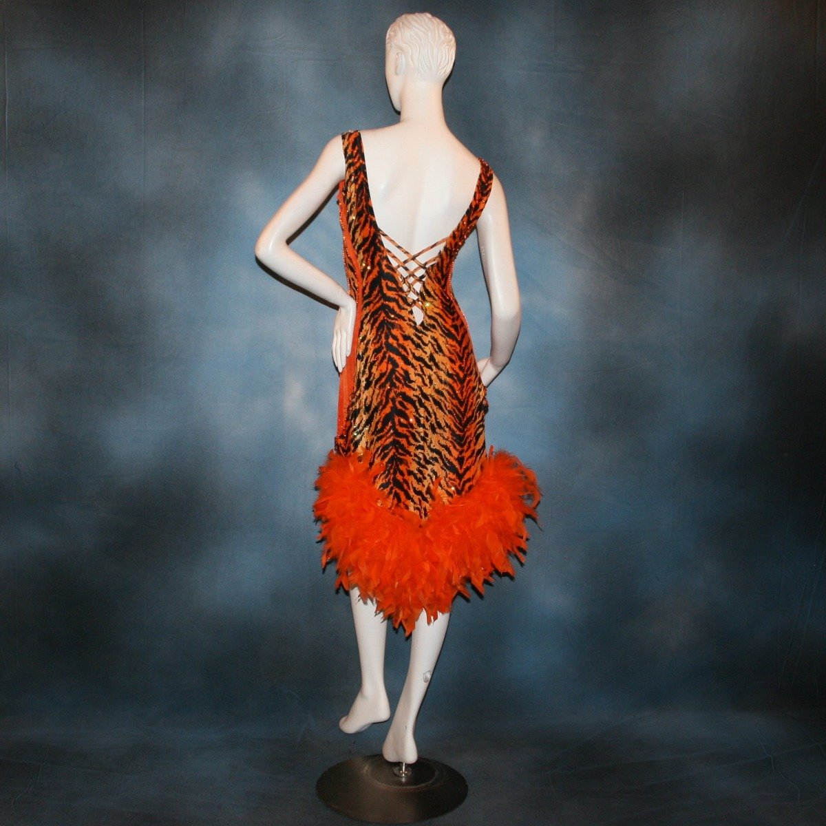Crystal's Creations back view of orange & black tiger print Latin/rhythm dress with orange chandelle feathers & hand beading