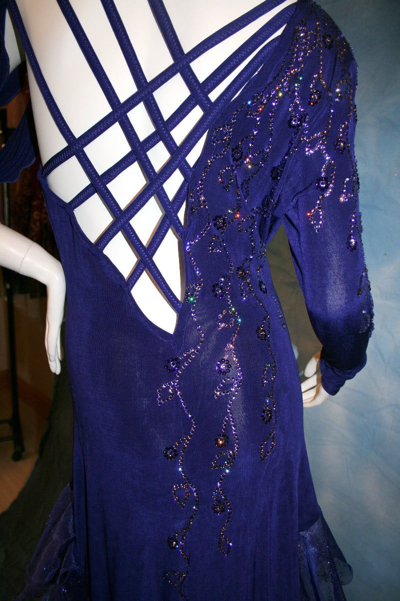 Crystal's Creations close up back view of  indigo blue Latin dress created of luxurious solid slinky with extensive Swarovski rhinestone work & hand beading