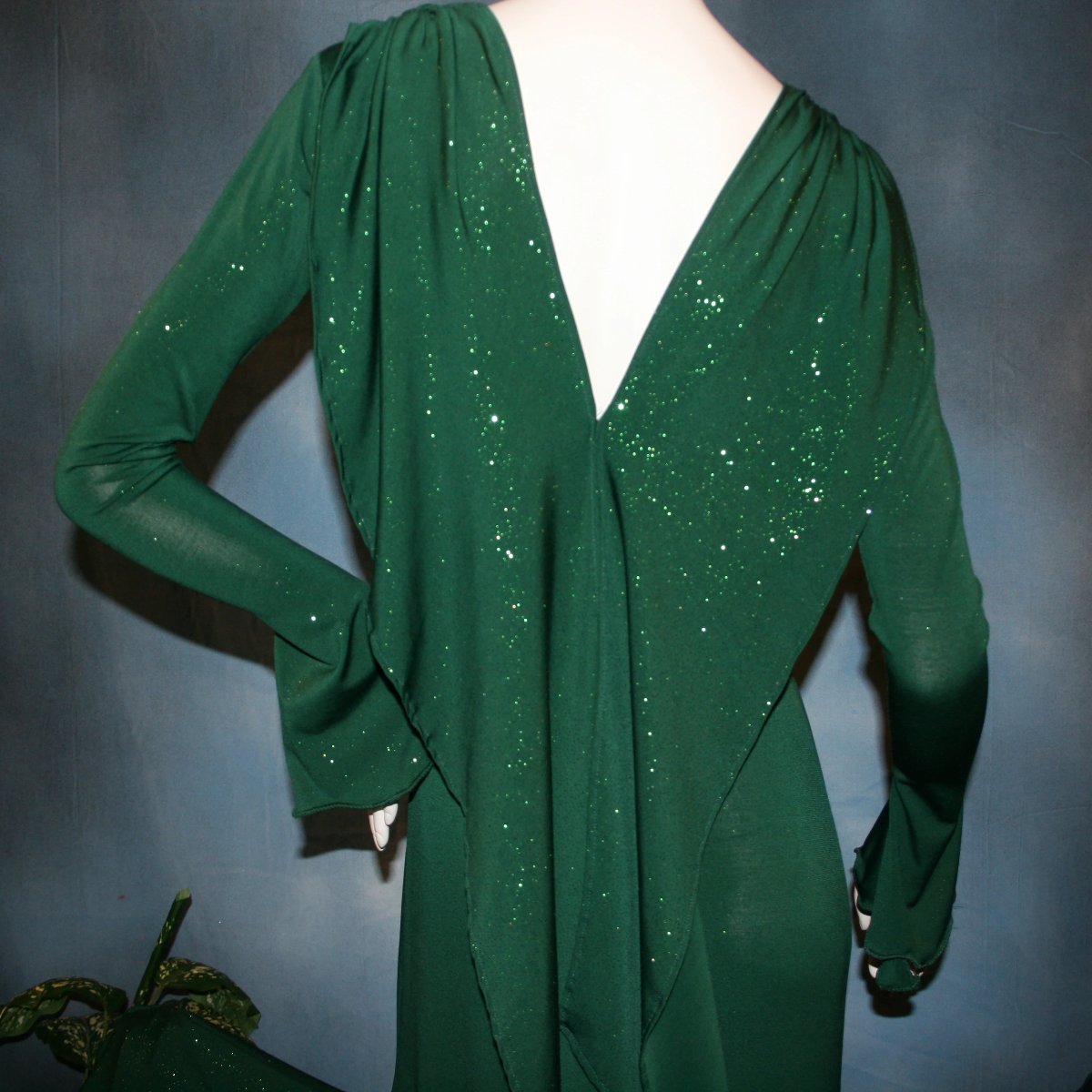 Crystal's Creations upper back view of Green social ballroom dress was created in luxurious deep emerald glitter slinky, with full  & flaring skirt bottom, long flair sleeves & draping trailing down the back makes this gorgeous dress very elegant & classy!